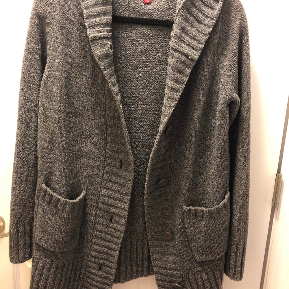 Woman’s gray button up sweater size large